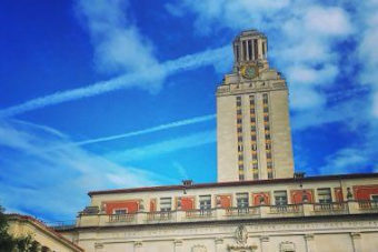 UT Tower with blue sky and clouds